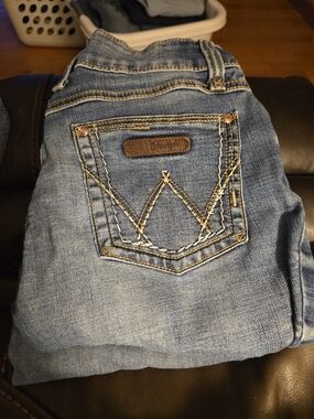 Wrangler Light Blue Bootcut Jeans with Embroidered Back Pocket